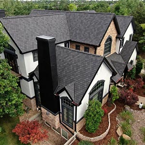 Large house with dark gray composite roof